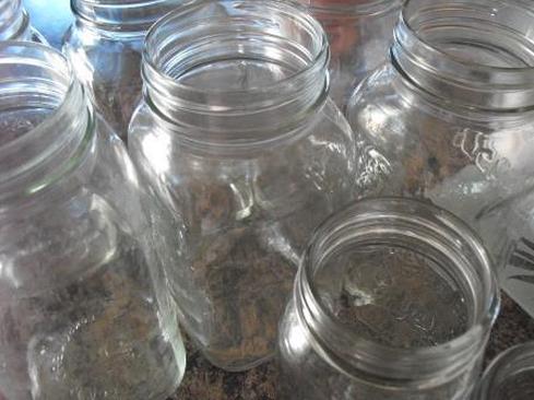 Canning Jars to preserve Garden Fresh Homemade Salsa using ripe tomatoes.