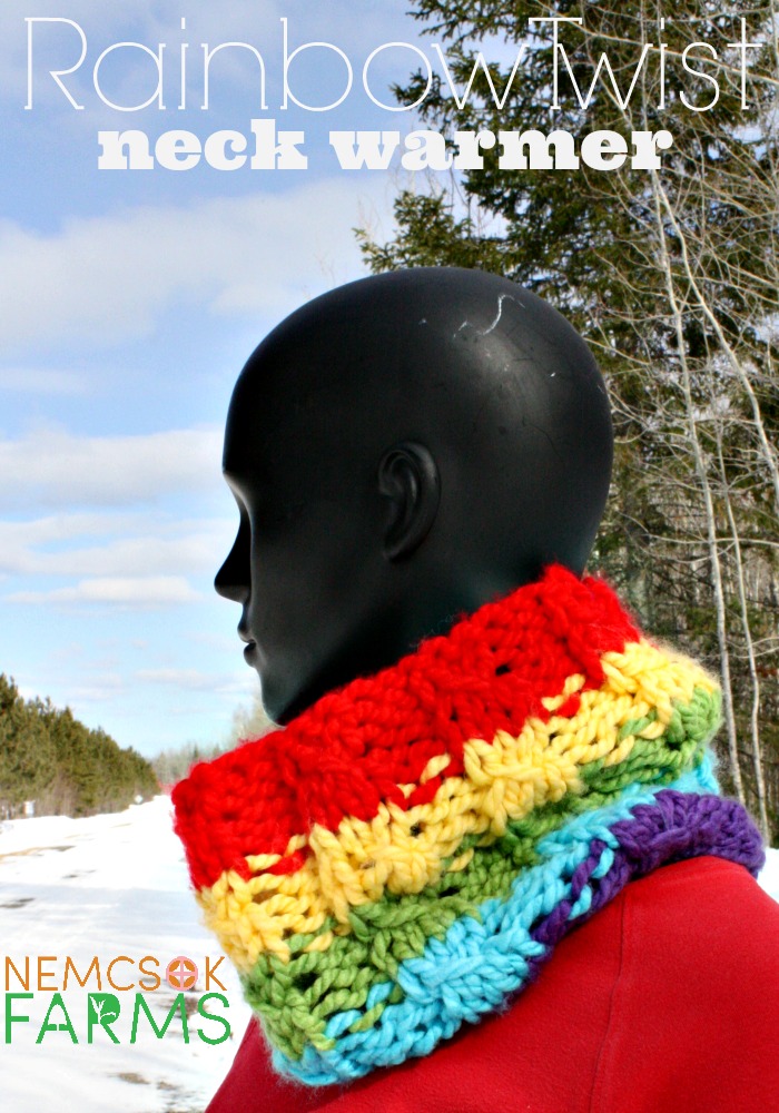 Free Knitting Pattern for a Hand Knit Neck Warmer or Cowl in a rainbow pattern, with a faux or mock cable.  A super quick knit, good for spring fall and winter