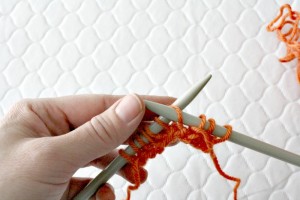 How to Make a Purl Stitch. Part 3 of a step by step tutorial on the basic stitches of knitting.