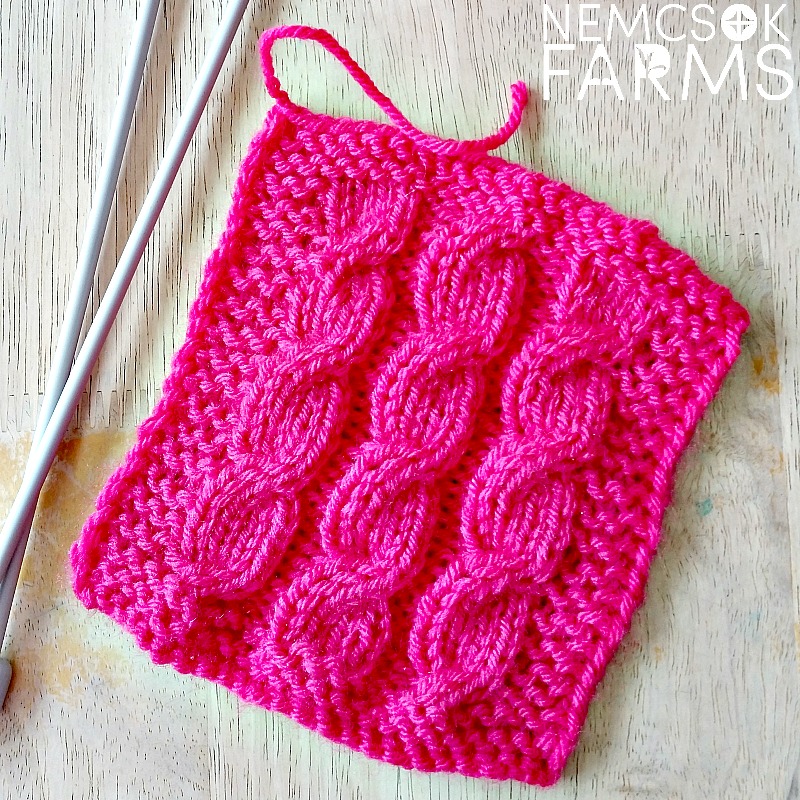 Join in on the knitting fun with the Cascading Cables Blanket Square pattern and be part of the Harmony Blanket Knit-A-Long