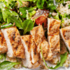 Grilled chicken breast served with veggies