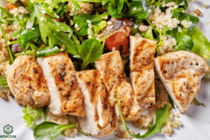 Grilled chicken breast served with veggies